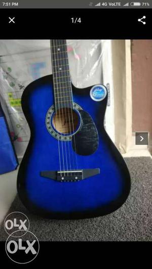 Blue And Black Cutaway Acoustic Guitar Screenshot