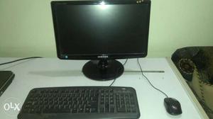 Computer Monitor, Mouse, And Keyboard