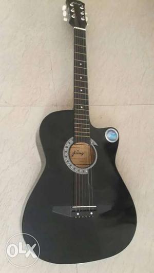 Good condition guitar with 2picks and cover 38 inch with