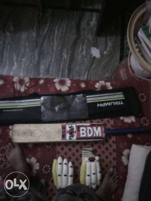 Its bdm bat 1 pair of gloves and 1 brand new bat
