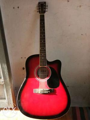 One month old Black And Red Wooden Cutaway Acoustic Guitar