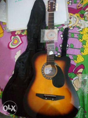 Orange And Black Single Cutaway Acoustic Guitar