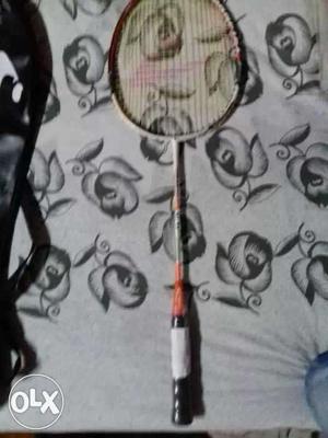 Orange And Gray Badminton Racket