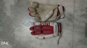 Pair of batting gloves. Want to sell urgently.