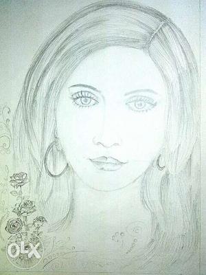 Potrait of girl drawn on drawing sheet