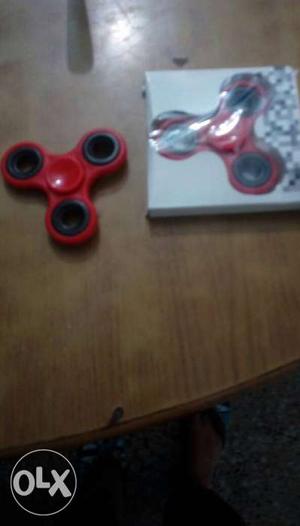 Red Hand Spinners