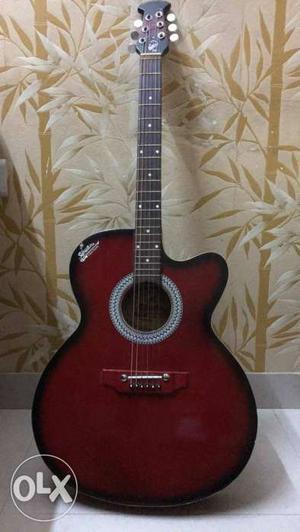 Red big box guitar 1 month ago...with bag and 3 trings