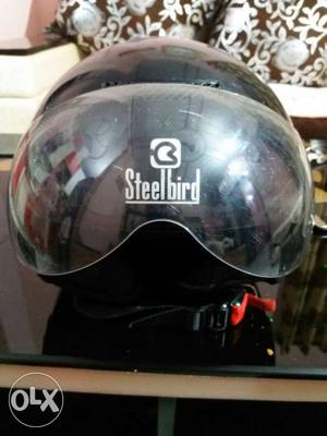 Steel bird open face helmet.