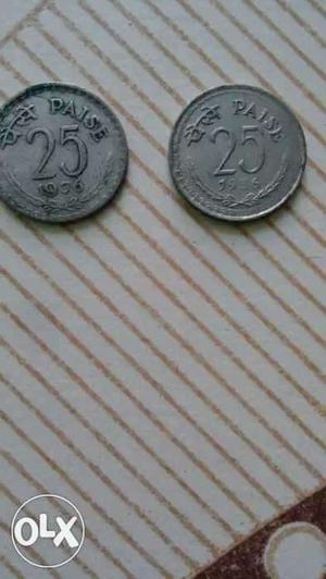 Two Round Gray 25 Paise Coins
