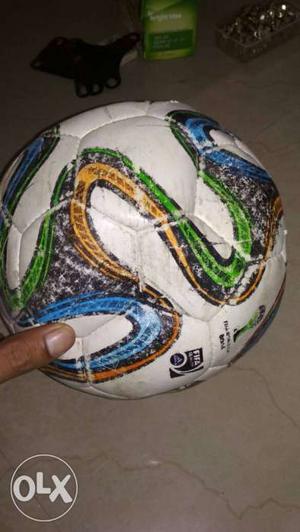 White, Green, And Blue Soccer Ball
