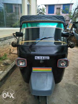 Black And Gray Auto Rickshaw