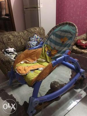 Baby's Blue And Brown Bouncer Seat