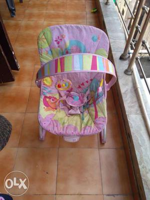 Baby's Pink And Yellow Bouncer