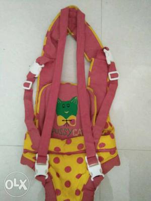 Baby's Red And Yellow Carrier