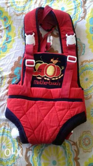 Baby's Red, Black And Yellow Carrier