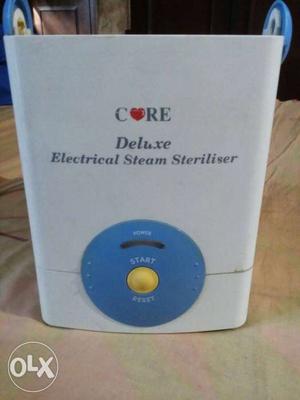 Core deluxe electrical steam steriliser brand new