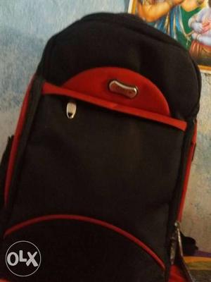 Red And Black Backpack Laptop bag 3 months use