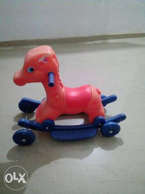 Red And Blue Plastic Pony Rocking Ride On With Wheels