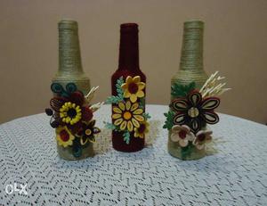 Three Rope Wrapped Floral Bottles