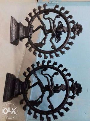 A pair of Natraj metalic figures