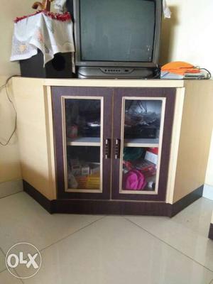 Brown Wooden Television Stand With CRT Television