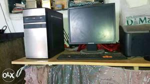 Flat Screen Computer Monitor, Keyboard, And Computer Tower