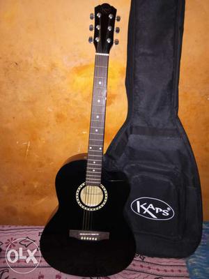 I am seliing my black Guitar with black guitar Bag