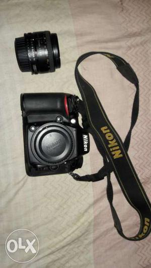 Nikon  with 50mm 1.8 prime lense and lowepro bag