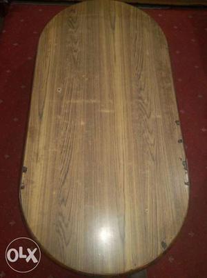 Oval brown center table only