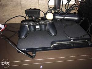 Ps3 with 2 remotes and one move and  games 120gb hard