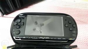 Psp with a cover and a carrying case