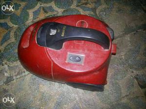 Red And Black Sanyo Vacuum Cleaner