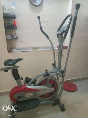 Red And Gray Elliptical Trainer