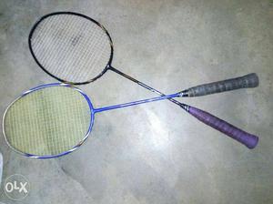 Two Purple Badminton Rackets