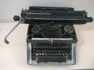 Typewriter, running, serviced, maintained.