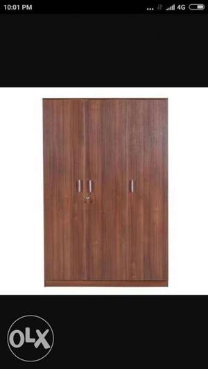 6months old new 3 door wooden wardrobe with good