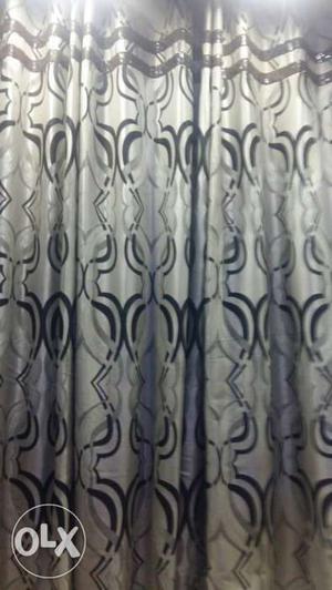 9ft length grey n black colour curtains as good