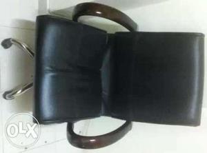 Black Leather Rolling Armchair
