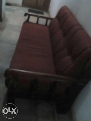 Brown Wooden Framed Red Padded Futon