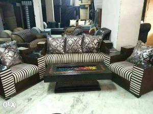 Designer center table with sofa set at satya