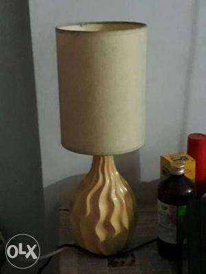 Elegant ceramic table lamp with white fabric