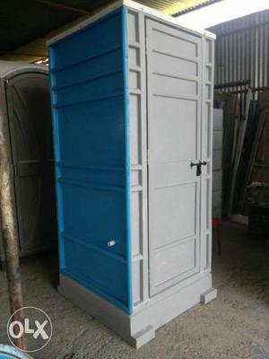 Gray And Blue Plastic Shed