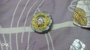 Gray And Yellow Beyblade