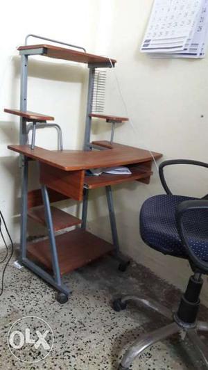 Gray Frame And Brown Wooden Computer Desk