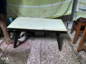 Rectangular White And Black Wooden Four-footed Coffee Table