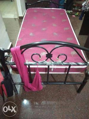 Single Bed with mattress.Relocating from the