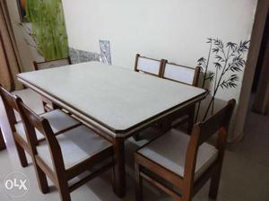 Strong good Dining table of pure teakwood four chairs.made