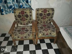 Two Brown Wooden Base Floral Padded Armchairs