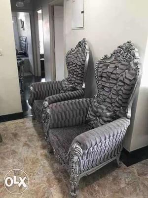 Two Gray Floral Print Wing Chairs
