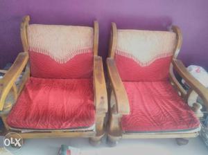 Two Red Padded Wooden Armchairs